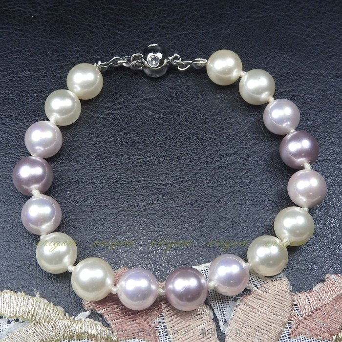 珍珠林~8MM一珠一結珍珠手鍊~南洋深海硨磲貝珍珠:紫色、白色#277+2