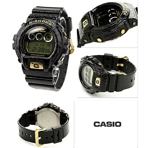 G-SHOCK CASIO 卡西歐鱷魚皮紋造型鏡面處理面盤黑色電子錶型號：DW