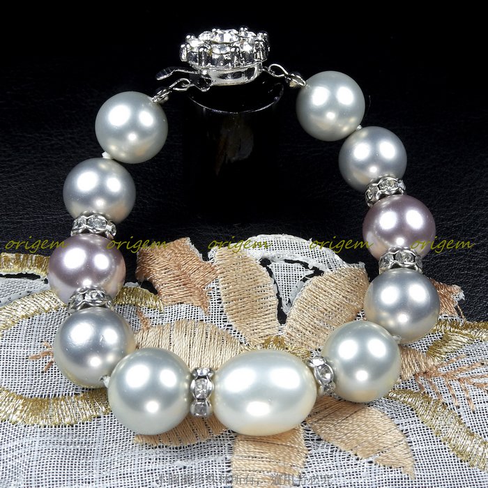 珍珠林~一珠一結12MM搭配蛋型珍珠手鍊~南洋硨磲貝霧面珍珠:深灰、淺灰、紫、白#529+3